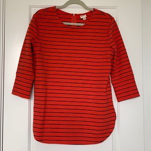 Red/orange strip shit with navy blue stripes